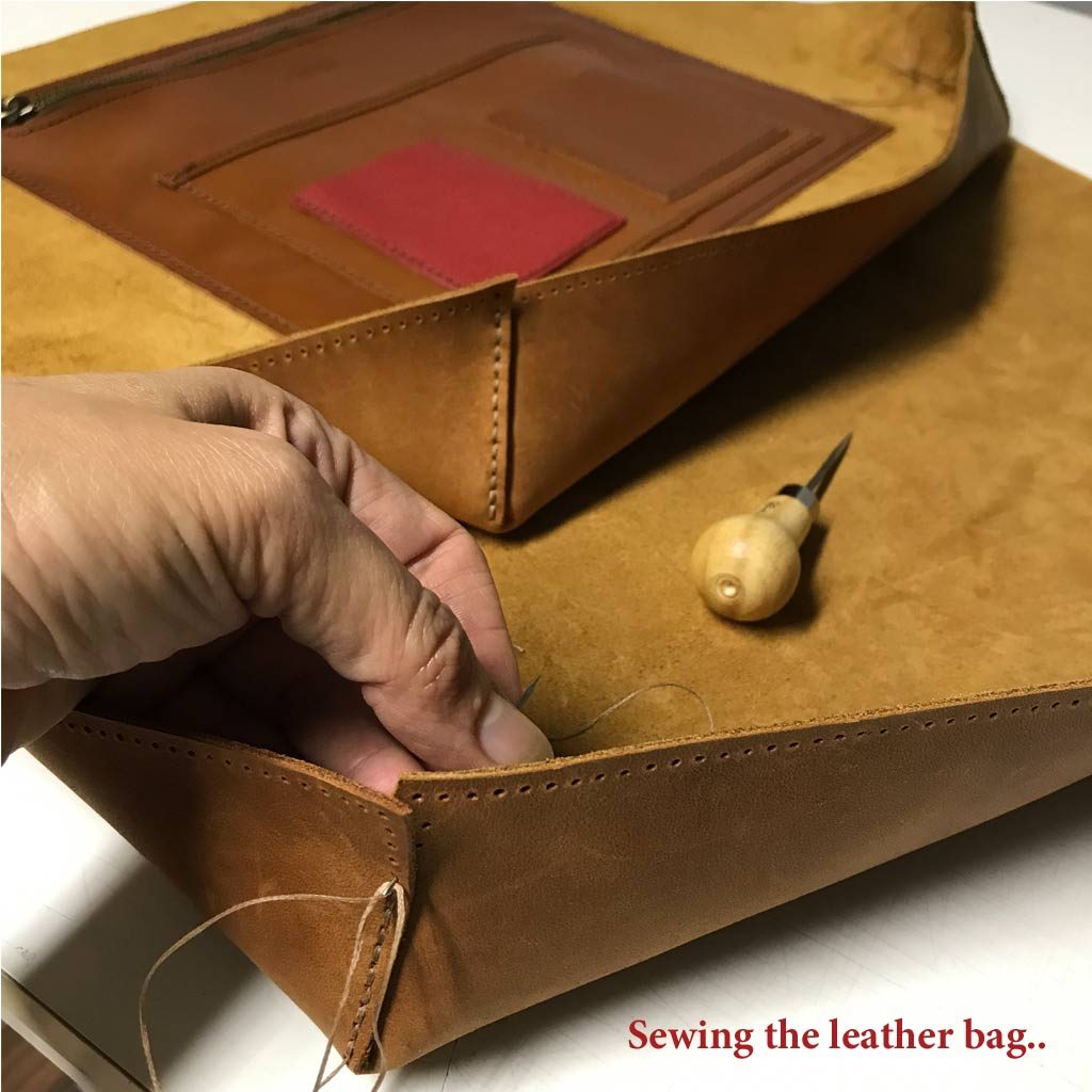 Ledertasche cognac braun nähen per Hand. Handgenäht in Deutschland.