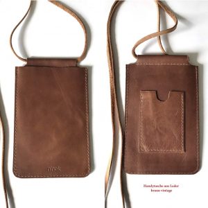Handytasche zum umhängen aus Leder mit Karten Geld Fach in braun vintage. Minimalistische Handy Ledertasche aus robusten Leder handgefertigt in Deutschland.