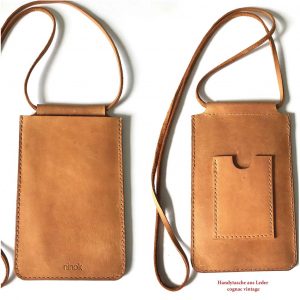 Handytasche zum umhängen aus Leder mit Karten Geld Fach in cognac vintage. Minimalistische Handy Ledertasche aus dickem robusten Leder handgefertigt in Deutschland.