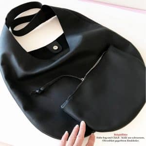 Lederclutch schwarz aus pflanzlich gegerbtem Rindsleder, große halbkreisförmige Clutch, Kosmetiktasche, Geldbörse aus Büffelleder, ca. 20x30cm, mit Reißverschluss und Band. Ideal als herausnehmbares Innenfach für große Taschen. Passende Hobo Bag in schwarz aus Olivenblatt gegerbtem Leder gibts in unserem Shop.